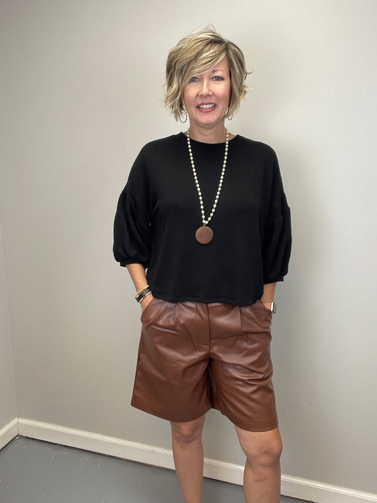Faux leather pleated shorts